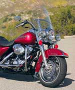 The Road King's easily detached windshield offers the least weather protection (which is good or bad, depending on the temperature) with a width of 23.0 inches and no standard lowers. Harley's accessory catalog offers plenty of options. The Road King's easily detached windshield offers the least weather protection (which is good or bad, depending on the temperature) with a width of 23.0 inches and no standard lowers. Harley's accessory catalog offers plenty of options.